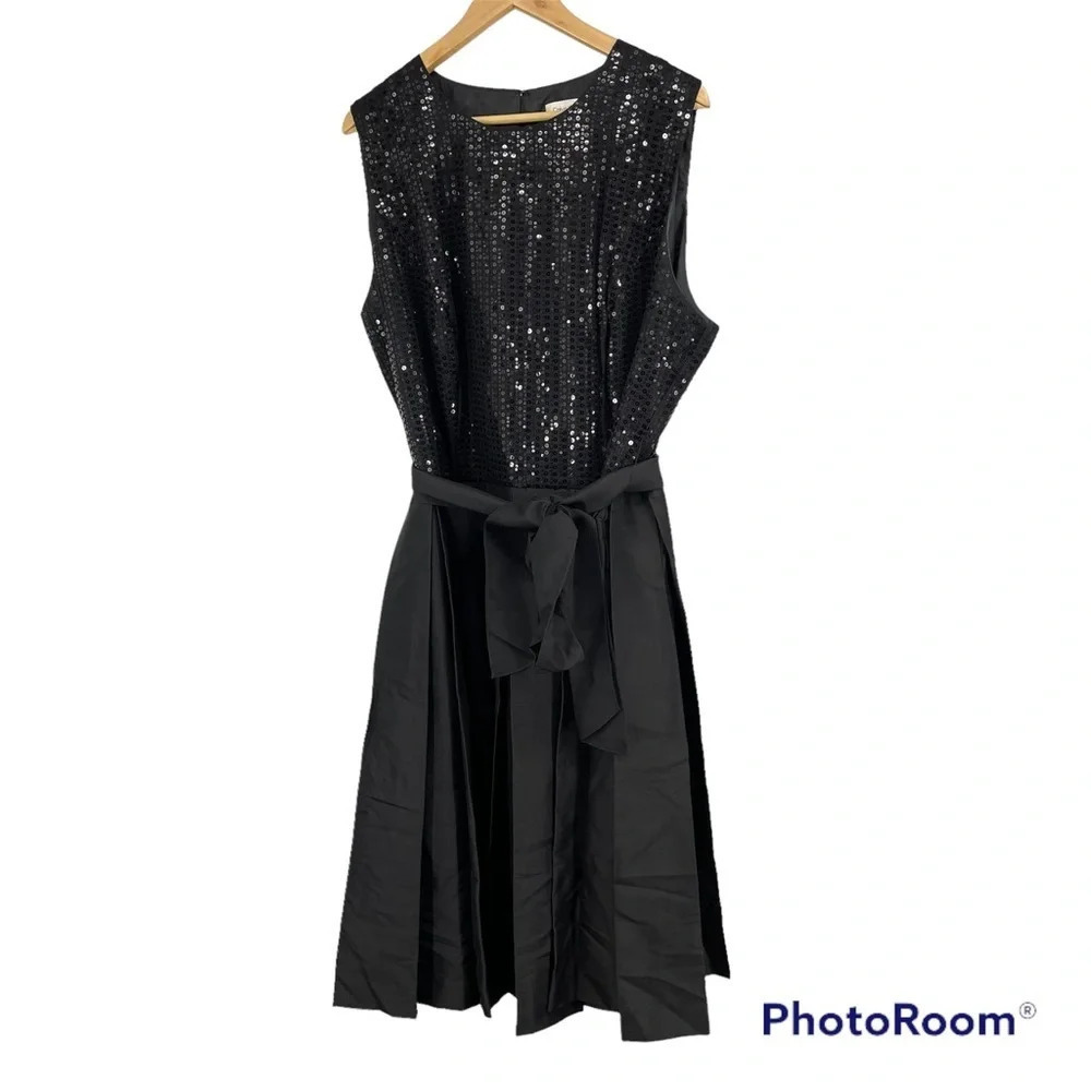 Calvin Klein black dress. Pleated satin skirt sequin upper belted. Size 22